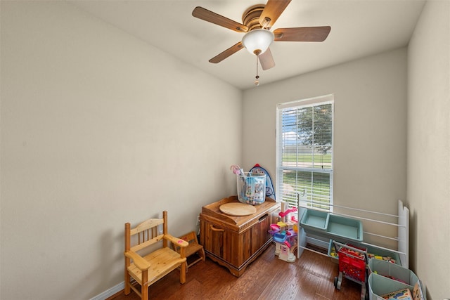 playroom featuring ceiling fan and wood finished floors