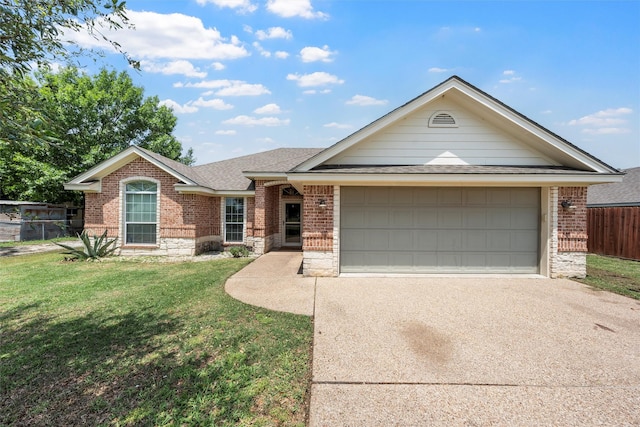 ranch-style home featuring a front lawn, fence, roof with shingles, brick siding, and driveway