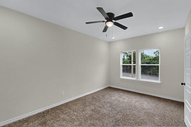 carpeted spare room with recessed lighting, baseboards, and ceiling fan