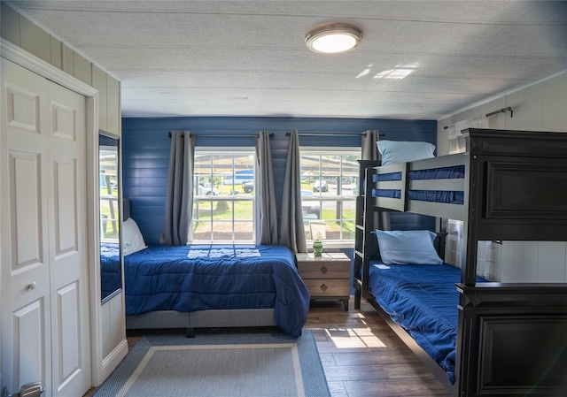 bedroom with wood finished floors