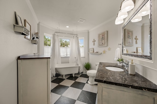 8121 Cahoba Dr, Fort Worth, TX 76135 - full bathroom with a freestanding bath, vanity, crown molding, tile patterned floors, and toilet