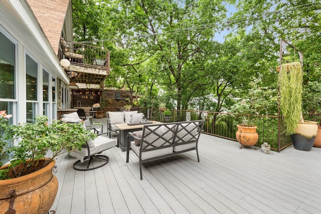 8121 Cahoba Dr, Fort Worth, TX 76135 - wooden terrace with an outdoor hangout area and view of wooded area