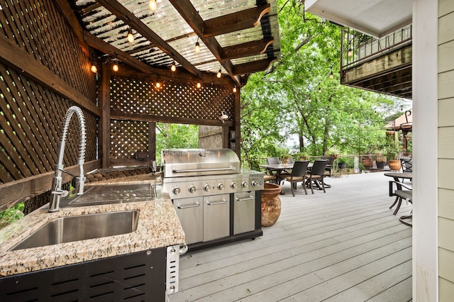 8121 Cahoba Dr, Fort Worth, TX 76135 - wooden terrace featuring outdoor dining space, an outdoor kitchen, a sink, a pergola, and a grill