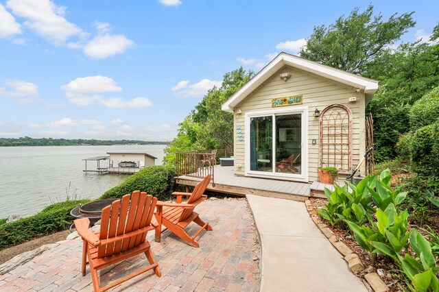 8121 Cahoba Dr, Fort Worth, TX 76135 - view of patio with a deck with water view