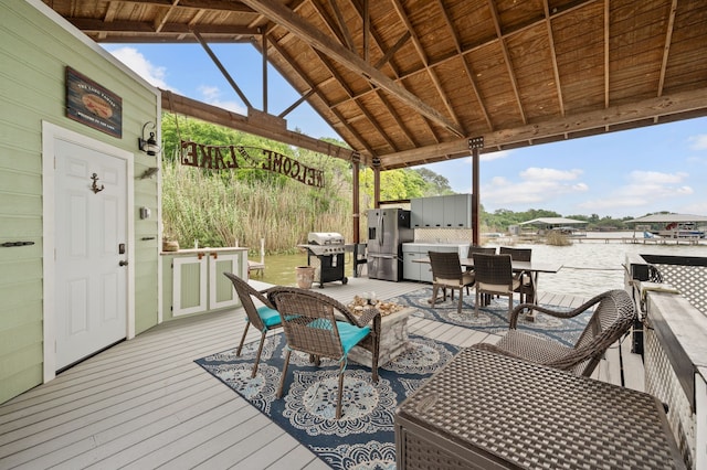 8121 Cahoba Dr, Fort Worth, TX 76135 - wooden deck featuring area for grilling, a gazebo, and outdoor dining space