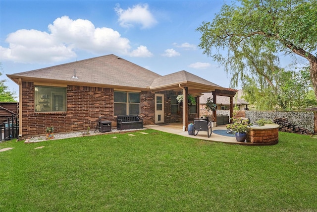 452 Northbrook Ave, Oak Point, TX 75068 - rear view of house featuring a lawn, a patio area, brick siding, fence, and a shingled roof