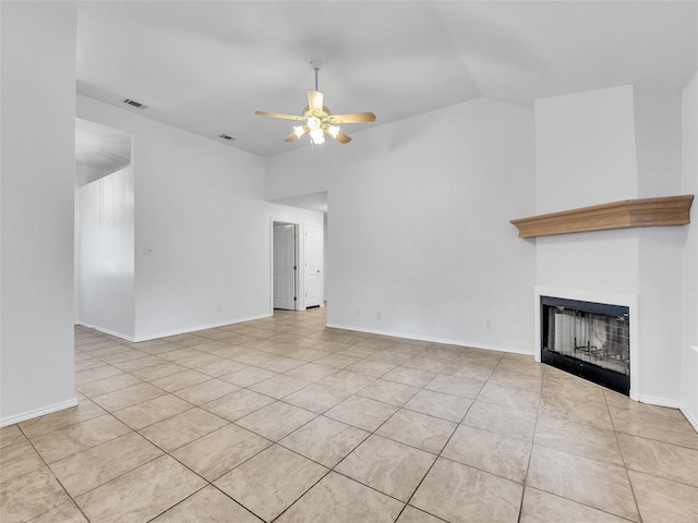 unfurnished living room featuring ceiling fan, a fireplace, high vaulted ceiling, light tile patterned floors, and visible vents