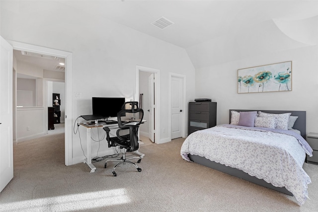 bedroom featuring attic access, visible vents, vaulted ceiling, carpet floors, and baseboards