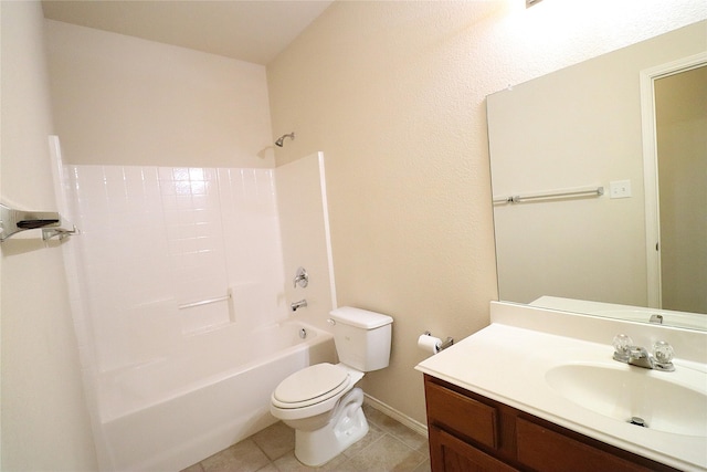 full bathroom featuring tile patterned flooring, bathtub / shower combination, vanity, toilet, and baseboards
