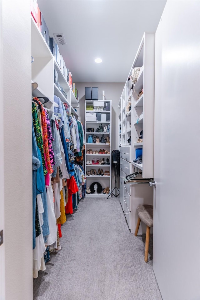 walk in closet with carpet flooring and visible vents