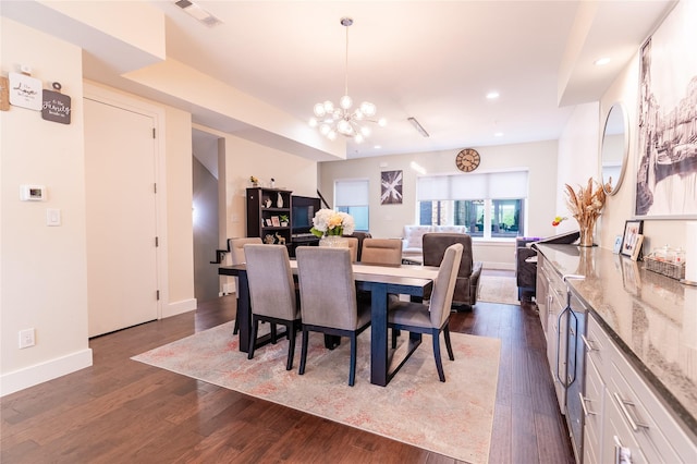 dining area with visible vents, baseboards, recessed lighting, dark wood-type flooring, and a chandelier