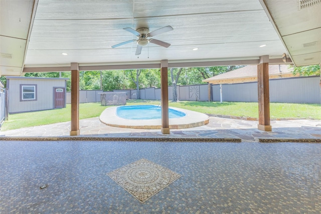 2418 Ingleside Dr, Grand Prairie, TX 75050 - view of patio / terrace featuring a ceiling fan and an outdoor structure