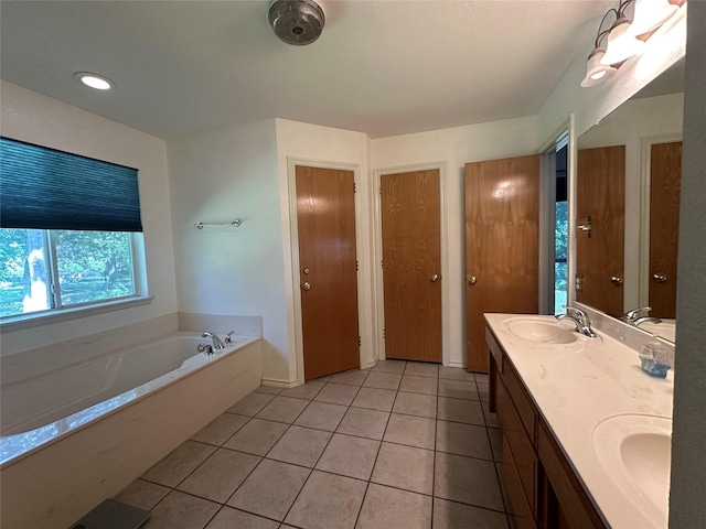 824 Imogene Ct, Azle, TX 76020 - bathroom with tile patterned flooring, a sink, a bath, and double vanity