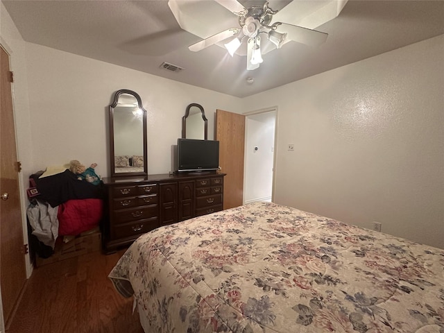 824 Imogene Ct, Azle, TX 76020 - bedroom with a ceiling fan, dark wood-type flooring, and visible vents