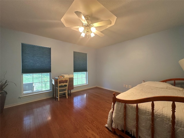 824 Imogene Ct, Azle, TX 76020 - bedroom with baseboards, a ceiling fan, and wood finished floors
