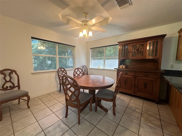 824 Imogene Ct, Azle, TX 76020 - dining space with visible vents, baseboards, ceiling fan, and light tile patterned floors