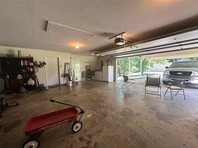 824 Imogene Ct, Azle, TX 76020 - garage featuring independent washer and dryer, freestanding refrigerator, and a garage door opener