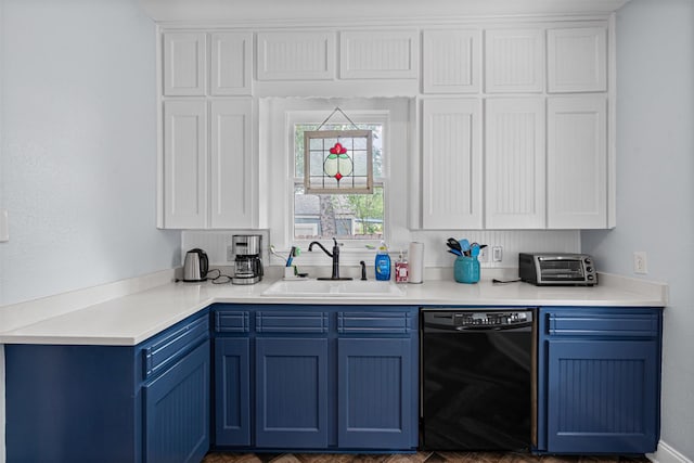 kitchen with blue cabinetry, a sink, light countertops, a toaster, and black dishwasher