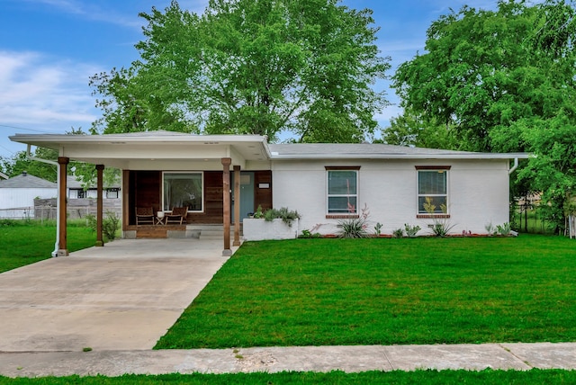 ranch-style home featuring driveway, an attached carport, and brick siding