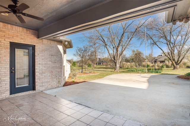 view of patio featuring ceiling fan