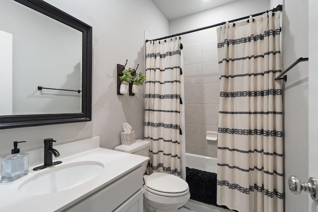 full bath featuring toilet, shower / bath combination with curtain, and vanity