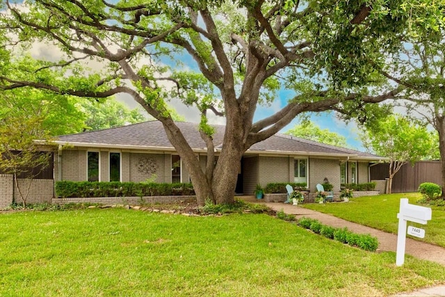 7449 Tophill Ln, Dallas, TX 75248 - single story home with brick siding