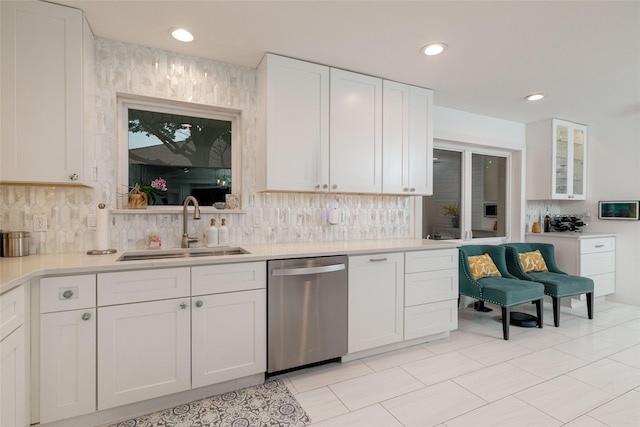 7449 Tophill Ln, Dallas, TX 75248 - kitchen with dishwasher, white cabinets, backsplash, light countertops, and recessed lighting