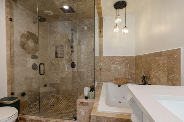 7449 Tophill Ln, Dallas, TX 75248 - full bath with a tub with jets, a shower stall, tile walls, toilet, and vanity