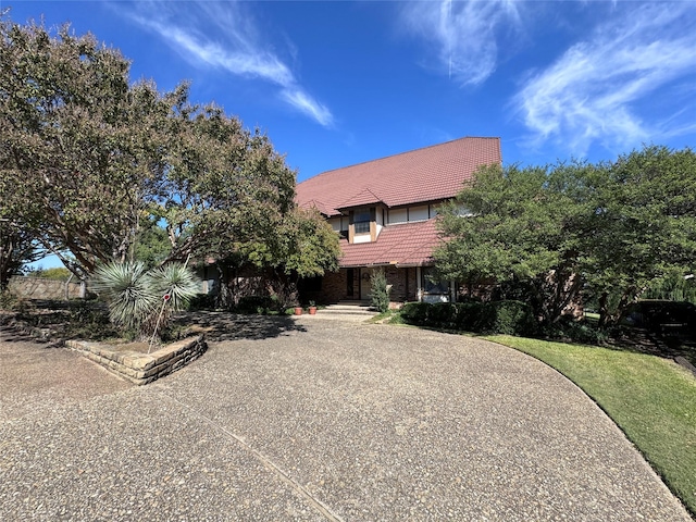 601 Guadalajara Cir, Irving, TX 75062 - view of front of house with a tile roof
