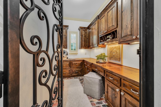7101 Royal Birkdale Dr, Cleburne, TX 76033 - bedroom featuring a raised ceiling, light wood finished floors, baseboards, access to outside, and crown molding