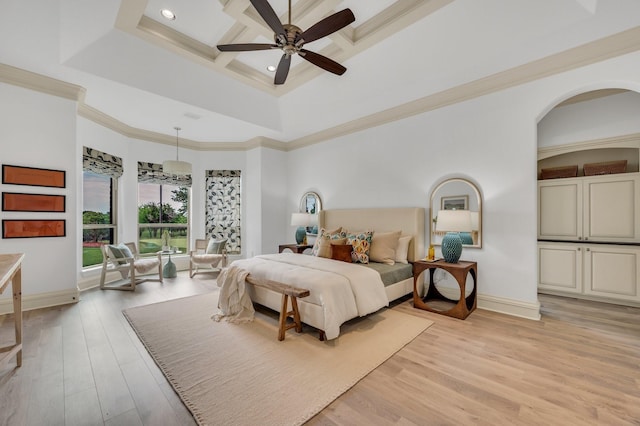 7101 Royal Birkdale Dr, Cleburne, TX 76033 - bedroom featuring arched walkways, wood finished floors, recessed lighting, baseboards, and crown molding