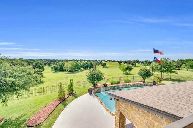 7101 Royal Birkdale Dr, Cleburne, TX 76033 - view of property's community with a swimming pool, an area to practice putting, and a patio