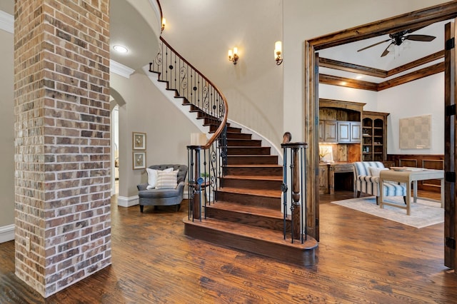 7101 Royal Birkdale Dr, Cleburne, TX 76033 - entryway featuring stairs, baseboards, a high ceiling, and dark wood-style floors