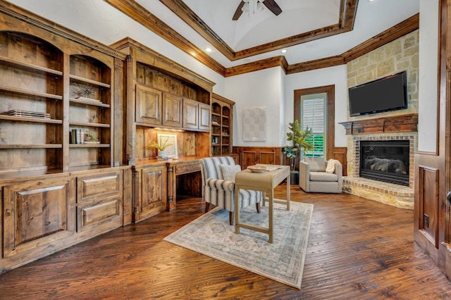7101 Royal Birkdale Dr, Cleburne, TX 76033 - living room featuring a fireplace, high vaulted ceiling, a ceiling fan, dark wood-style flooring, and beamed ceiling