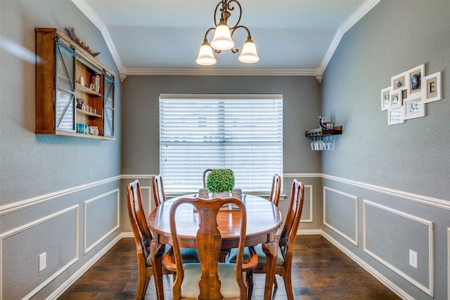 4604 Valleyview Dr, Mansfield, TX 76063 - dining area featuring dark wood finished floors, crown molding, a decorative wall, a wainscoted wall, and a chandelier
