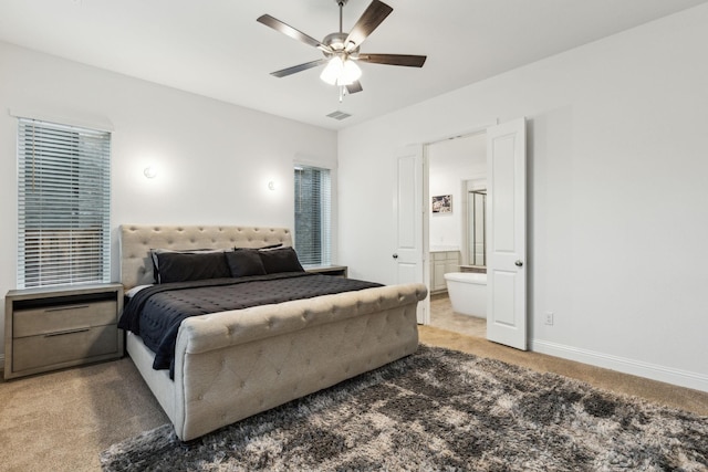 1520 Rough Rider Ct, Celina, TX 75009 - bedroom with connected bathroom, light carpet, a ceiling fan, baseboards, and visible vents