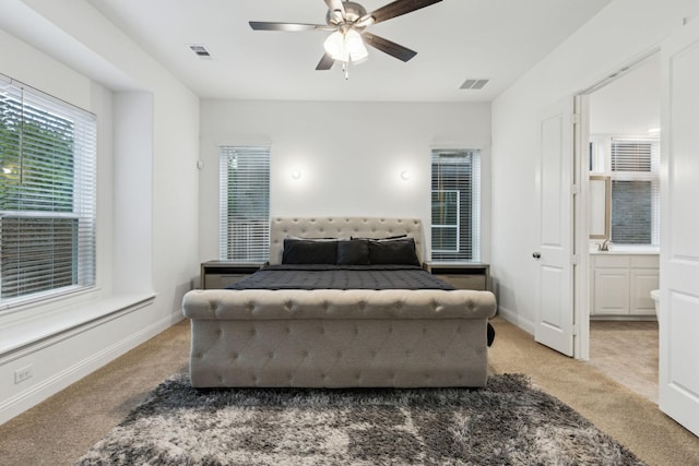 1520 Rough Rider Ct, Celina, TX 75009 - bedroom with ceiling fan, light carpet, ensuite bath, and visible vents