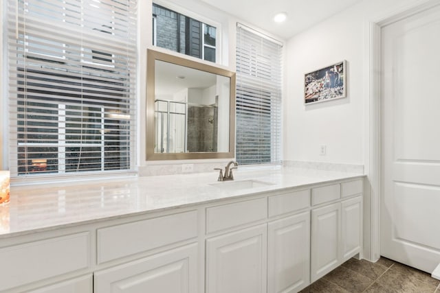 1520 Rough Rider Ct, Celina, TX 75009 - bathroom featuring a stall shower, vanity, recessed lighting, and tile patterned flooring