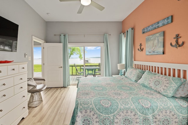 bedroom featuring access to outside, a ceiling fan, and light wood-style floors