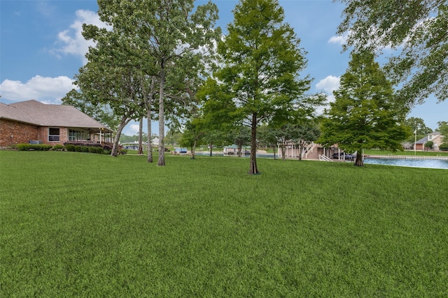 view of yard with a water view