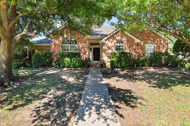 61 Sonora Dr, Trophy Club, TX 76262 - view of front of home with brick siding and a shingled roof