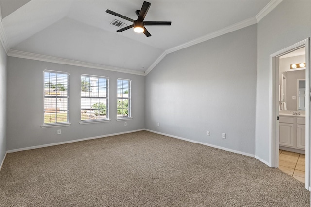 61 Sonora Dr, Trophy Club, TX 76262 - spare room with visible vents, crown molding, lofted ceiling, and light colored carpet