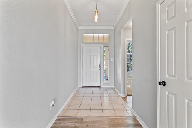 61 Sonora Dr, Trophy Club, TX 76262 - foyer featuring crown molding, light tile patterned flooring, and baseboards