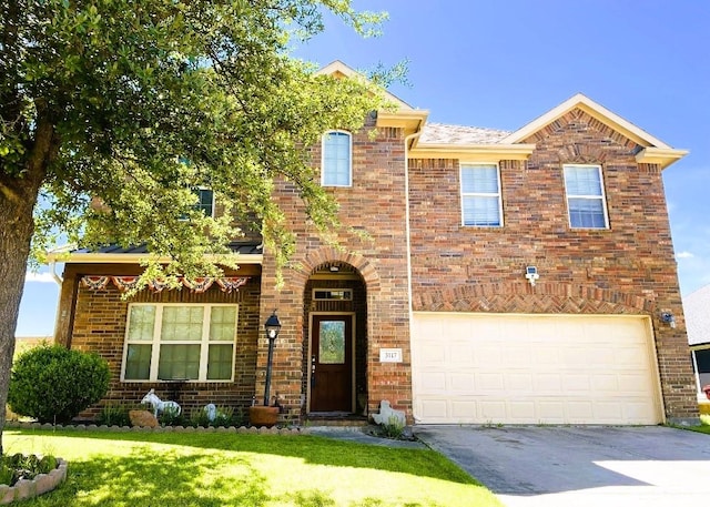 3117 Burwood Ln, Royse City, TX 75189 - view of front of house featuring an attached garage, concrete driveway, and a front lawn