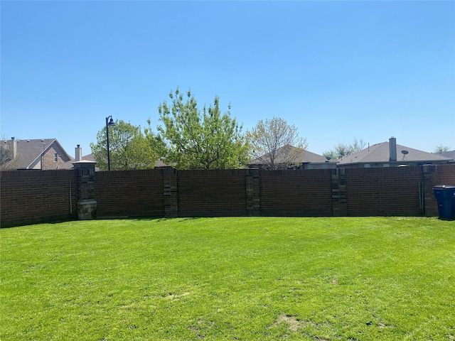 view of yard with fence
