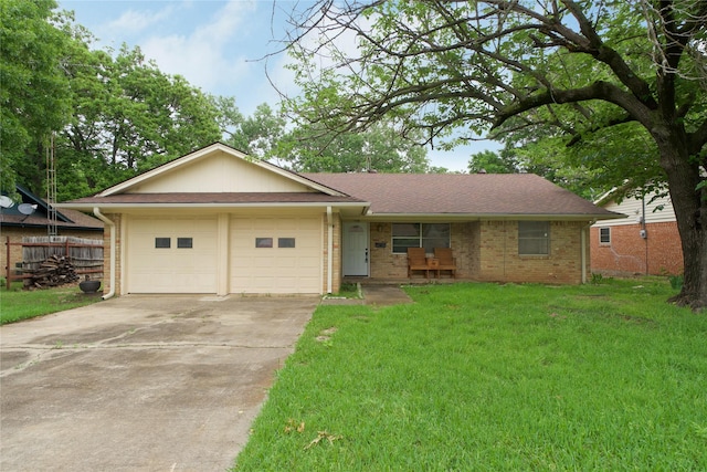 1112 Hillside Dr, Gainesville, TX 76240 - single story home with a garage, fence, a front yard, brick siding, and driveway
