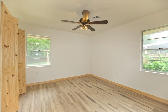 1112 Hillside Dr, Gainesville, TX 76240 - unfurnished room featuring baseboards, light wood finished floors, ceiling fan, and visible vents