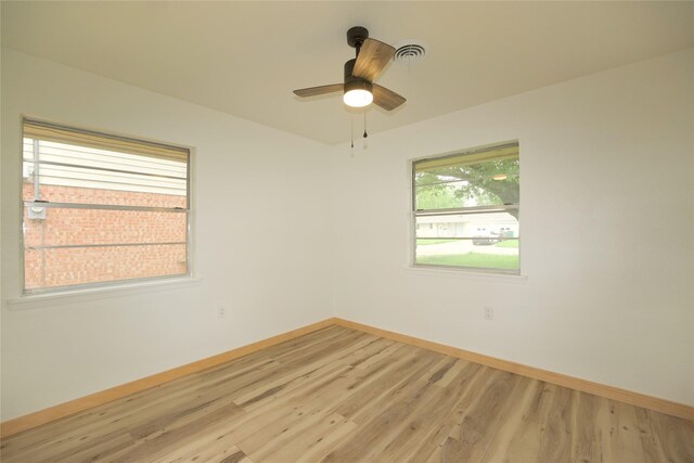 1112 Hillside Dr, Gainesville, TX 76240 - spare room with baseboards, ceiling fan, and light wood-type flooring