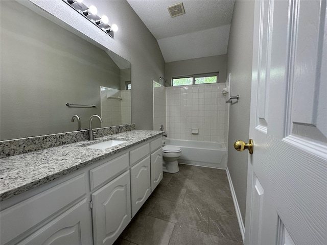 2129 San Simeon Dr, Mesquite, TX 75181 - bathroom featuring shower / bath combination, visible vents, vaulted ceiling, vanity, and toilet