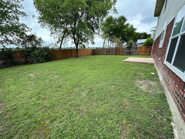 2129 San Simeon Dr, Mesquite, TX 75181 - view of yard featuring a fenced backyard and a patio area
